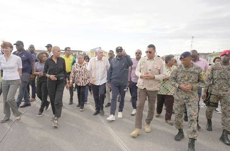 President Dr. Irfaan Ali on Monday joined several Caribbean Community (CARICOM) leaders, touring sections of western Jamaica ravaged by Hurricane Melissa