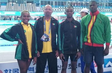 From left: Jamila Sanmoogan, National coach Sean Baksh, Leon Seaton Jr and Andrew Fowler at the FINA 2019 World Championships in South Korea.