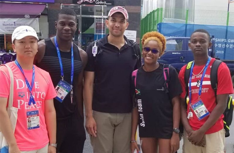 The trio with their interpreter (left) and former national swimmer Fabian Binns (centre) who is now in the United States Air Force stationed in Korea.