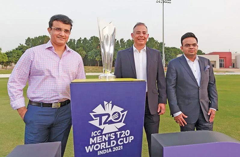 Sourav Ganguly, Manu Sawnhey and Jay Shah pose with the T20 World Cup. (International Cricket Council photo)