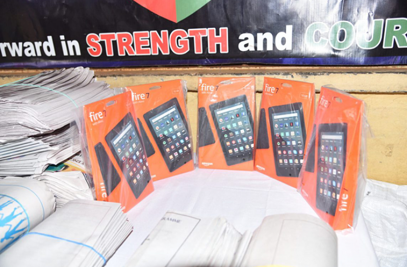 The ‘tablets’ and some of the print material distributed to the children of Region One (DPI photo)The tablets and some print material distributed to the Region One for school children