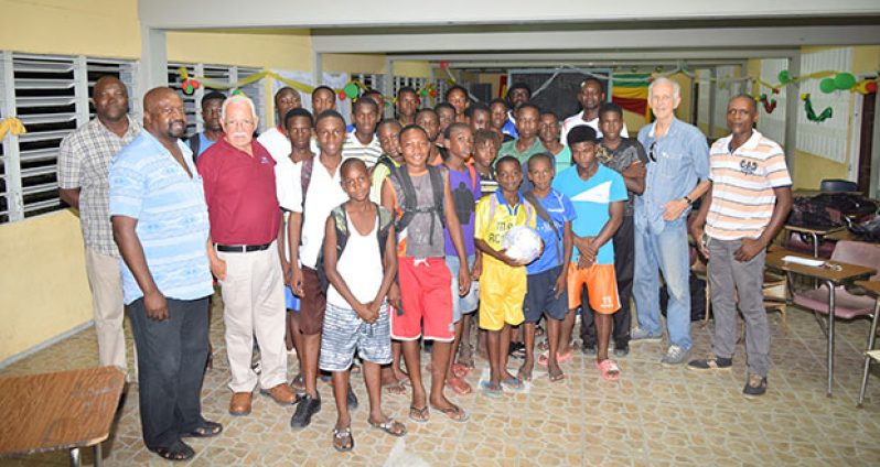 Buxton youngsters flanked by (L-R) David Hinds, ‘Reds’ Perreira, Lindon France, and Dave Martins, (Cullen Bess-Nelson photos)