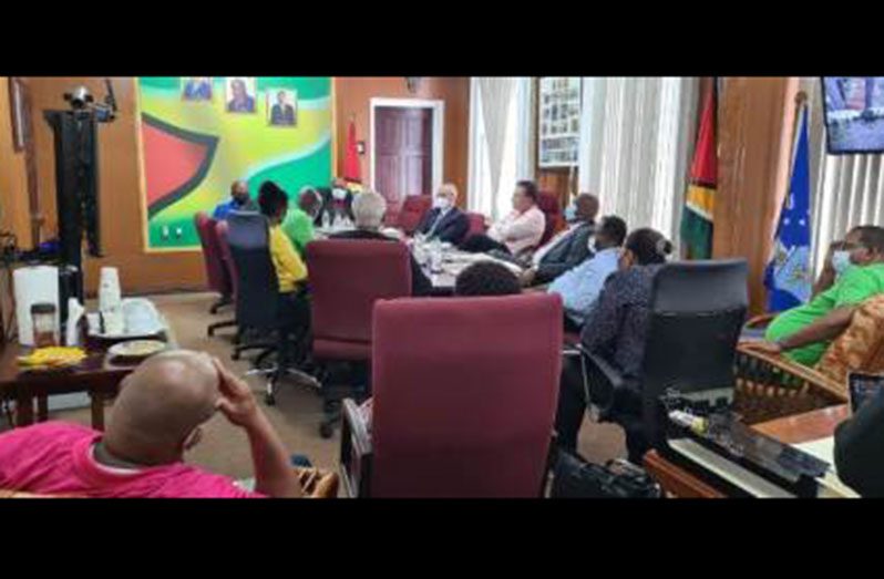 CEO of GO-Invest, Dr. Peter Ramsaroop meets with the delegation led by Dr. William Duguid, Minister of Housing, Lands and Maintenance of Barbados