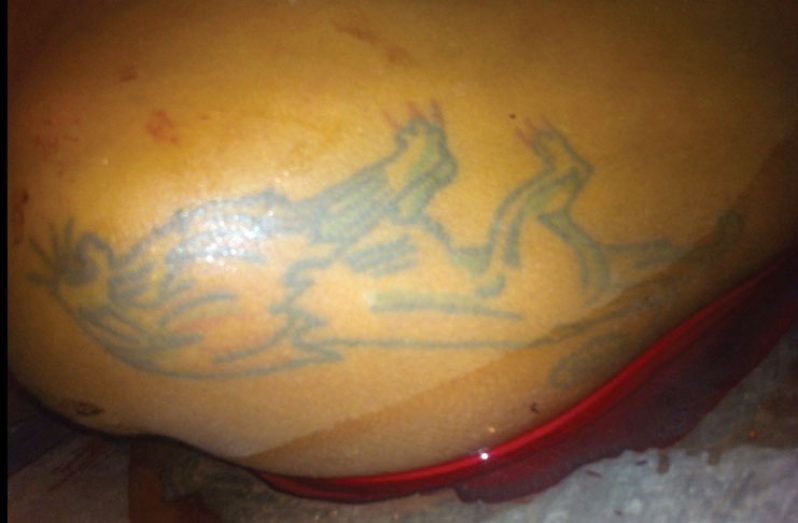 One of the tattoos on the unidentified man’s body
