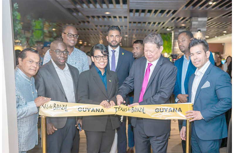 Minister of Tourism Industry and Commerce Susan Rodrigues flanked by government ministers and Dachin Group of Companies’ Chairman Derek Chin, and Managing Director Ryan Chin
