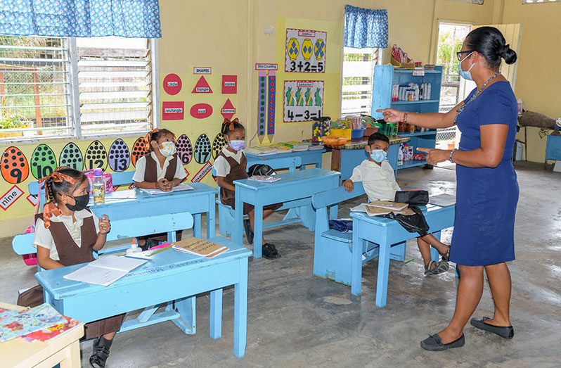 Teacher Joycelyn Joseph during a lesson with her nursery school children during the COVID-19 pandemic (Delano Williams photo)