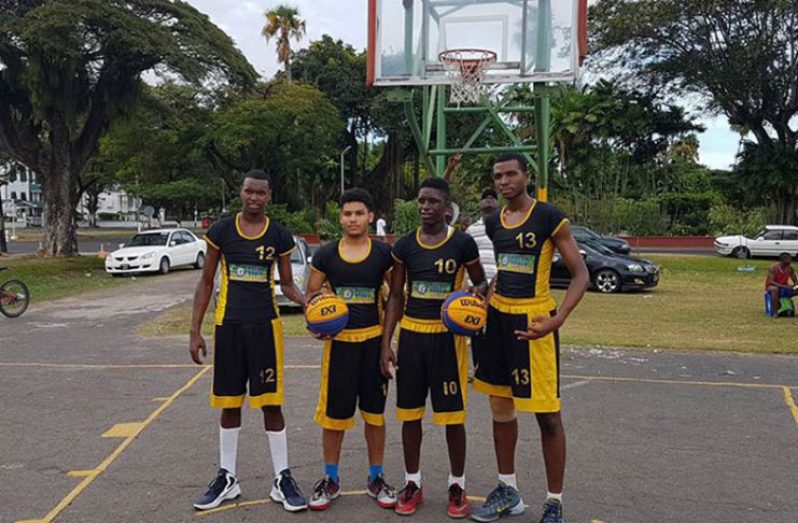 The Kwakwani Combine side (L-R): Jamal Gilkes, Jonathan Mangra and Timothy Thompson
