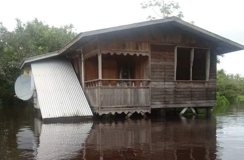 A house in Kwakwani inundated by flood waters (RDC photo)