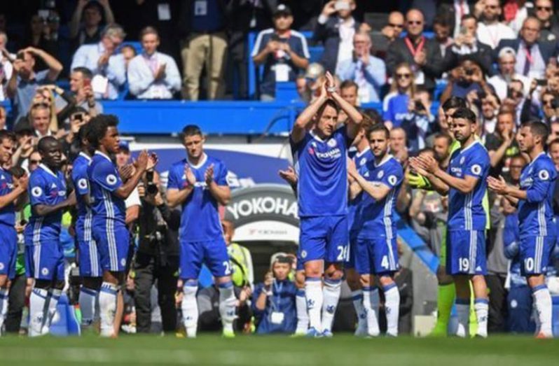 John Terry is given a guard of honour as he leaves the pitch.