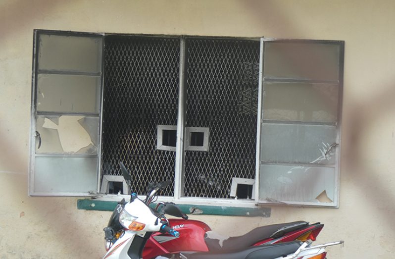 A broken window that was destroyed by the fire