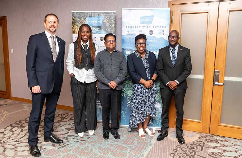 Senior Minister within the Office of the President with responsibility for finance, Dr Ashni Singh (centre), is flanked by Paulette Hamilton M.P. the UK’s trade envoy to the Commonwealth Caribbean (second from right); Regional Director for the Commonwealth Caribbean for the UK’s Department for Business and Trade, D’Jamila Ward (second from left); Sherwyn Naughton, Country Director for Trade and Investment at the British High Commission (first from right); and Chris Bennet, Managing Director at the Caribbean Council (first from left) (Delano Williams photos)