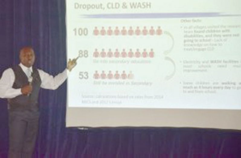UNICEF Monitoring and Evaluation (M&E) Specialist, Mr Michael Gillis, presenting some of the findings of the study to the audience at the Umana Yana a few weeks ago (Adrian Narine photo)