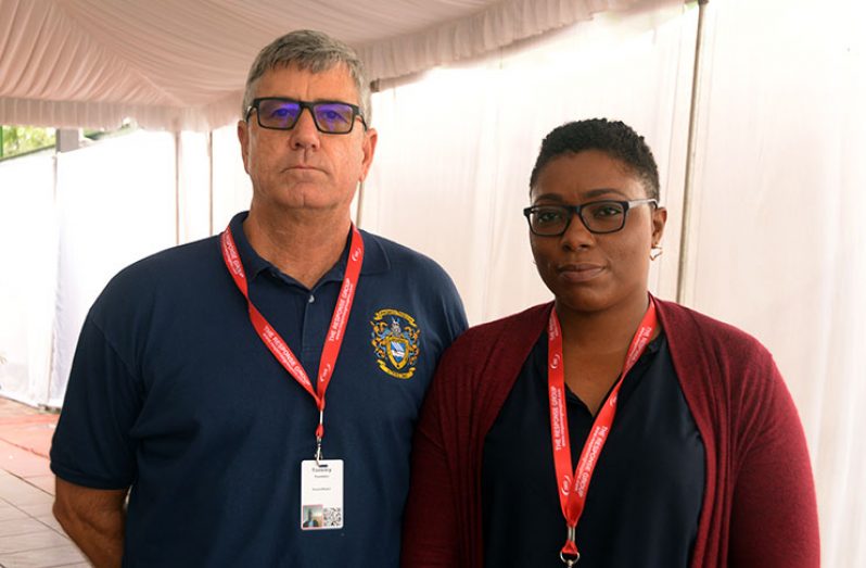 ExxonMobil’s Global Oil Spill Response Adviser, Tommy Tomblin (left) and Mitigation and Recovery Manager (Ag) of the CDC, Allana Walters (right) (Adrian Narine photo)