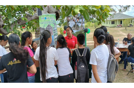 Youths interacting with an employee at the Iwokrama booth
(Alphonso Forte photos