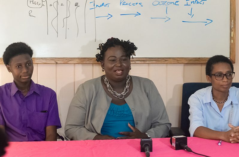 The head table at yesterday’s press conference, from left, GTU Prevention Coordinator, Danielle Daphness; GTU Director, Quincy “Gulliver” McEwan; and GTU Financial Officer, Natasha Yhap (Delano Williams photo)