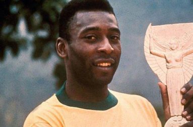 Pele pictured with the Jules Rimet trophy in 1970. He was given a replica of the trophy that will be auctioned.