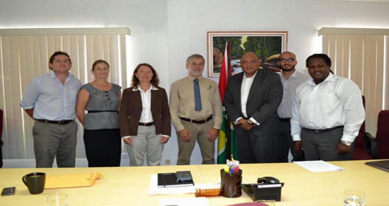 In photo, from left, are Protected Areas Officers, Thadaigh Baggallay and Anouska Kinahan; Head of Department, Frankfurt Zoological Society, Dr. Antje Muellner; FZS CEO, Dr. Christof Schenck; Minister Raphael Trotman; Commissioner of the Protected Areas Commission, Damian Fernandes; and Permanent Secretary, Joslyn McKenzie after signing of the MoU