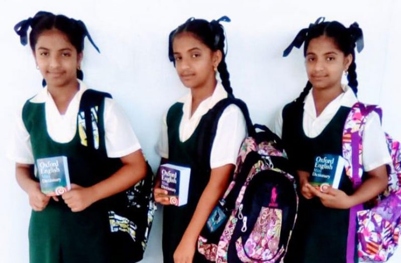 The triplets on their 12th birth anniversary