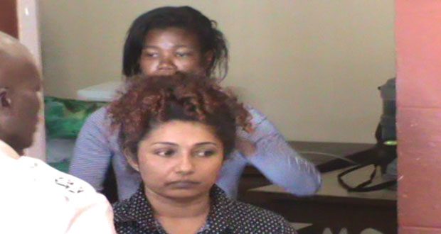 Defendant Nanda Ali (in front)
Defendant Vanessa Harper (standing behind Ali)