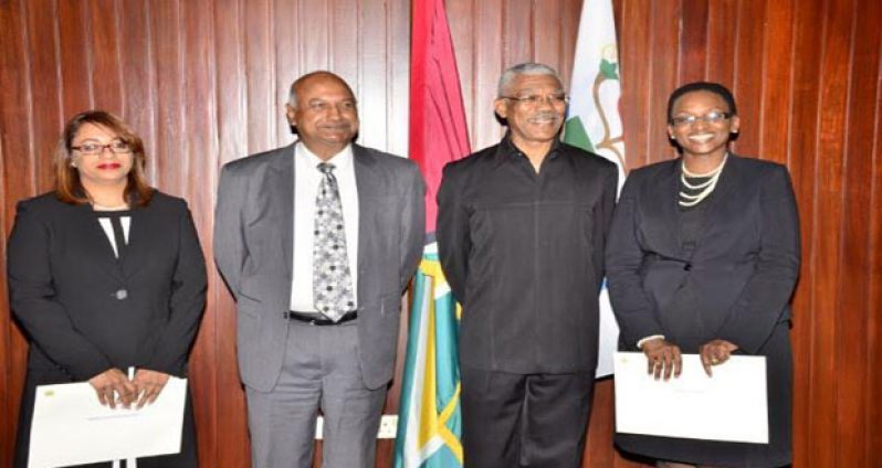 The two Puisne judges, Ms Jo-Ann Barlow (right) and Mrs Priya Sewnarine –Beharry (left ) with President David Granger and Chancellor of the Judiciary (ag) Carl Singh 
 