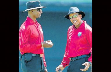 Regional umpires, Gregory Brathwaite of Barbados (left) and Joel Wilson of Trinidad and Tobago.