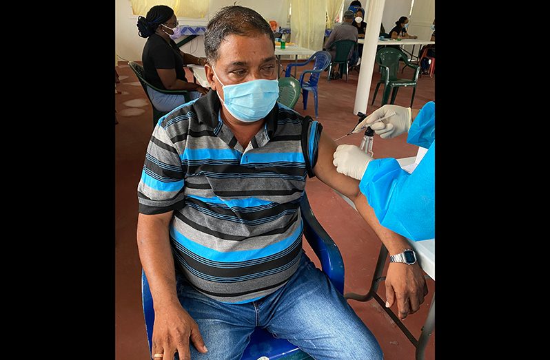 A Cotton Field, Region Two, resident recently took the COVID-19 vaccine