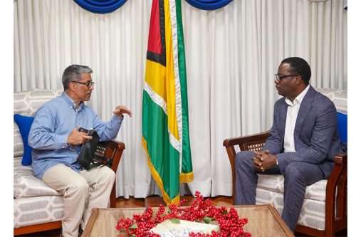 Foreign Affairs and International Cooperation Minister Hugh Todd (right) during a December 19, 2024 meeting with Venezuelan Ambassador to Guyana, Carlos Amador Perez Silva (MoFA photo)