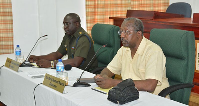 Chairman of the Commission, Col. (Ret’d) Desmond Roberts and Secretary to the Commission, Col. Denzil Carmichael during the press conference at the Department of Public Service