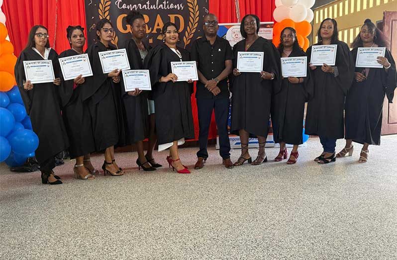 BIT CEO Richard Maughn with graduates on Sunday (BIT photo)