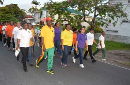 First Lady Sandra Granger, veterans of the Women’s Corps and others in their stride