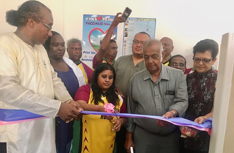 Focal Point Coordinator Ministry of Health, Alex Foster, Doctor-in-Charge, Skeldon Hospital, Ryan Campbell, along with members of the Florida Guyana Hope Inc cut the ceremonial ribbon to commission the new maternity ward