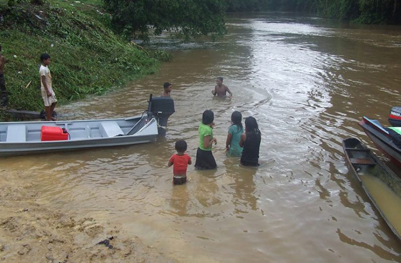 Women and children bathing in the Barama River (Laura George photo)