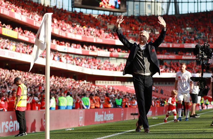 Arsenal manager Arsene Wenger waves to the fans after the match REUTERS/Ian Walton