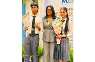 Dishon Nundalall and Ayesha Brijlall with Minister of Education, Sonia Parag, during the CSEC preliminary results announcement ceremony held in Georgetown in August (West Side High photo)