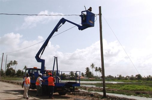 whim1 Contractors installing street lights in Whim, Corentyne, Berbice