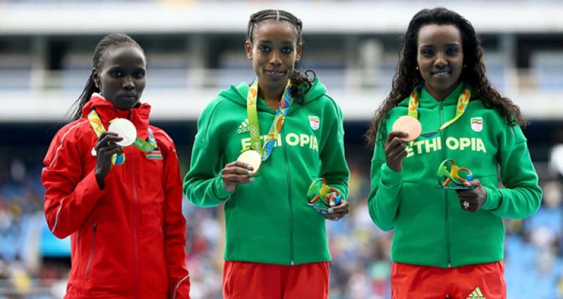 Almaz Ayana of Ethiopia - gold medal, Vivian Jepkemoi Cheruiyot of Kenya - silver and Tirunesh Dibaba of Ethiopia - bronze