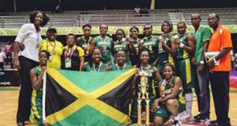 The winning Jamaica team pose with their trophy after beating the Dominican Republic in the final. (Photo courtesy Fiba Americas)
