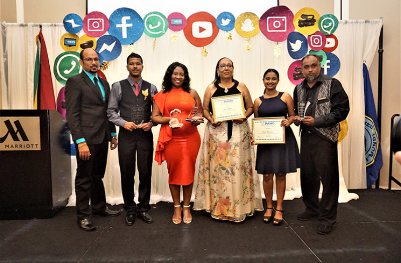 Guyana National Newspapers Limited (GNNL) General Manger, Donna Todd, with the Guyana Chronicle winners at the PAHO Media Awards (Carl Croker photo)