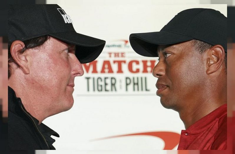 Phil Mickelson (left) and Tiger Woods address the media during a press conference on Tuesday in Las Vegas before The Match: (Mandatory Credit: Kyle Terada-USA TODAY Sports)
