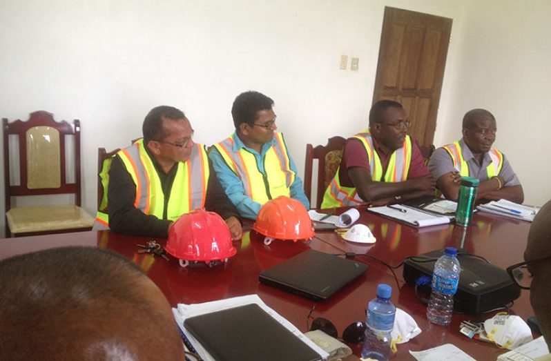 Officials from Puran Brothers Disposal Inc during discussions with officials of the Ministry of Communitie