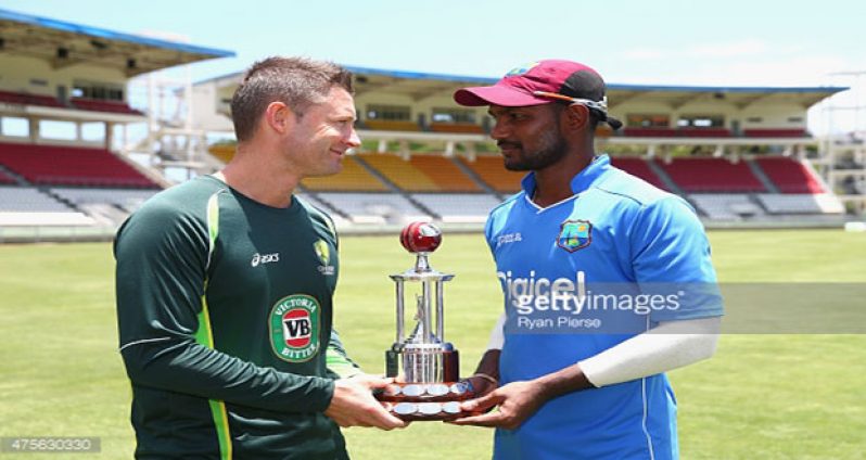 Captains Denesh Ramdin and Michael Clarke with the Frank Worrell Trophy. (Courtesy WICB Media/Randy Brooks)
