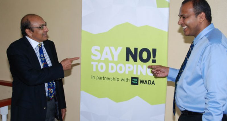 Say No To Doping! Minister of Culture, Youth and Sport, Dr Frank Anthony (right) and president of the Guyana Olympic Association at the MCYS Anti-Doping seminar yesterday.