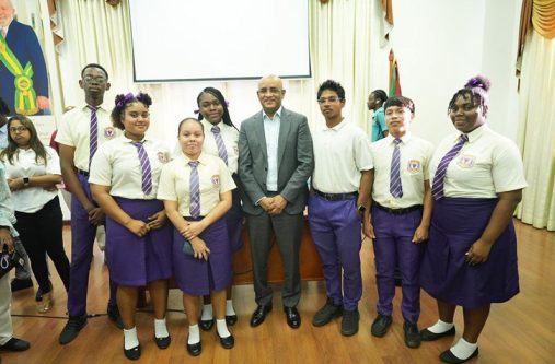 Vice President Dr. Bharrat Jagdeo, engaging some youths at the forum
