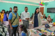 Liaison Officer at the UNFPA- Guyana, Adler Bynoe, with Minister of Human Services and Social Security, Dr Vindhya Persaud and other officials