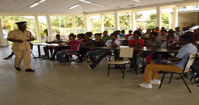 ‘D’ Division Commander, Stephen Mansell, speaking with youths prior to the undertaking of the vocational skills training