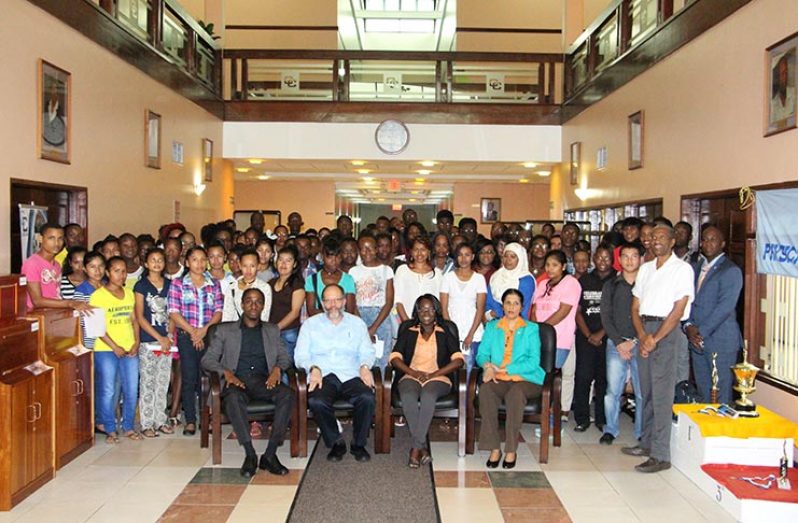 Flashback - CARICOM SG, Amb. Irwin LaRocque seated, (second, left) other senior CARICOM Secretariat officials, CARICOM Youth Ambassadors and participants of asocial media interaction in 2012