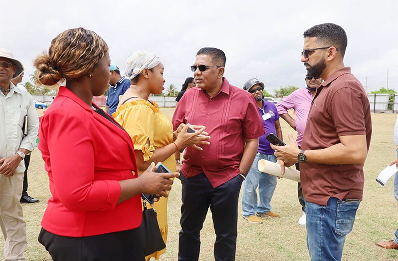 Agriculture Minister Mustapha interacting with farmers at the outreach on Saturday (Ministry of Agriculture photo)