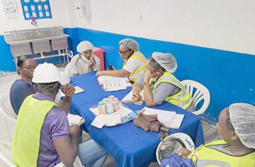The inspection team, comprising OSH Officers Mr. Ray Hosannah and Ms. Delcina Small,